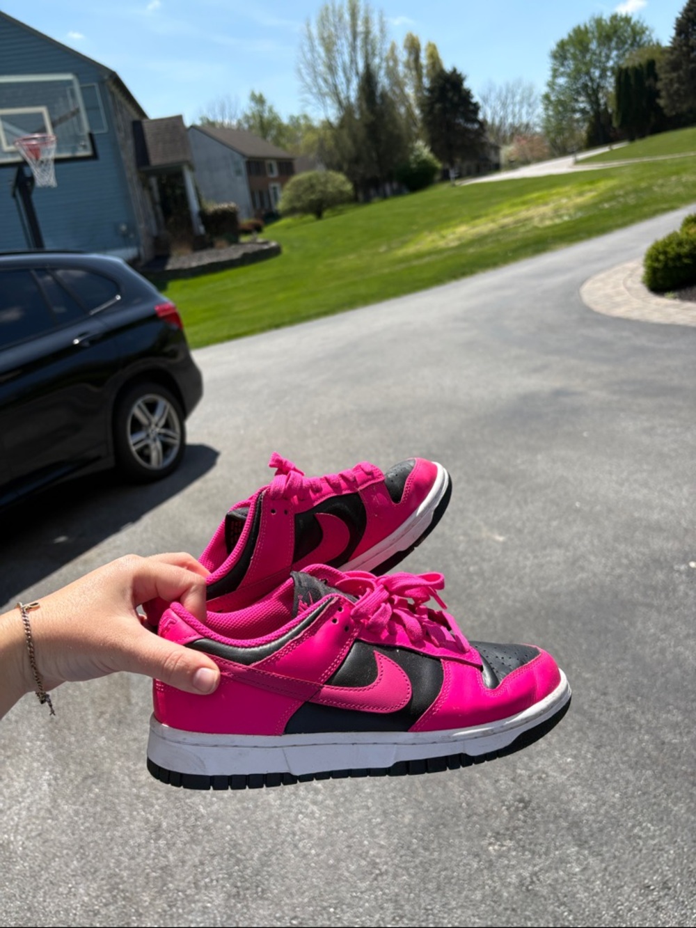 Nike Women’s Dunk Low Sneakers in Hot Pink and Black